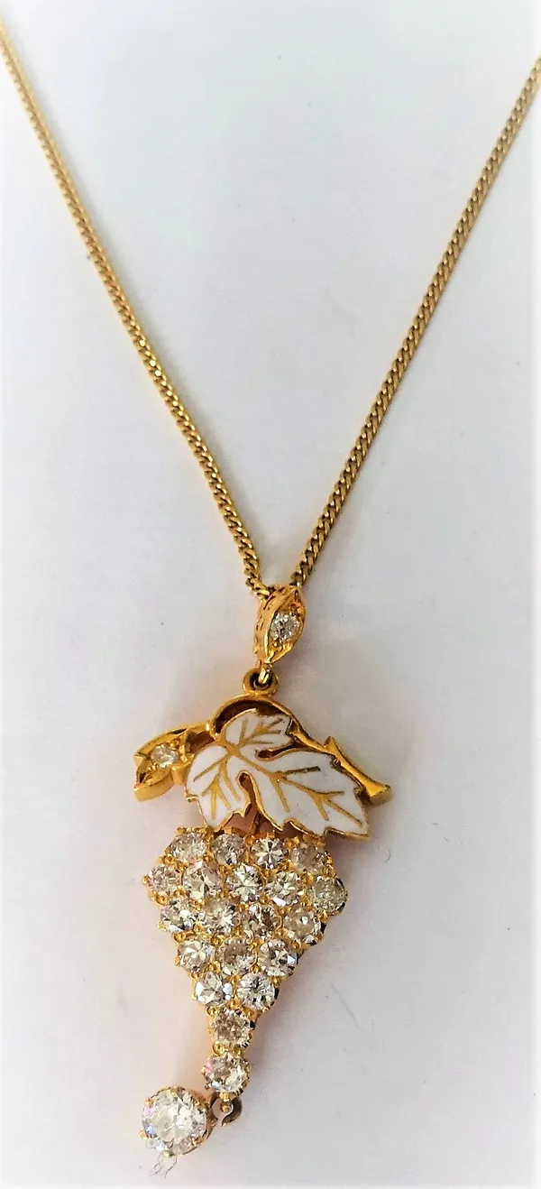 A gold, diamond set and white enamelled pendant, designed as a bunch of grapes, the front claw set with the principal circular cut diamond to the drop