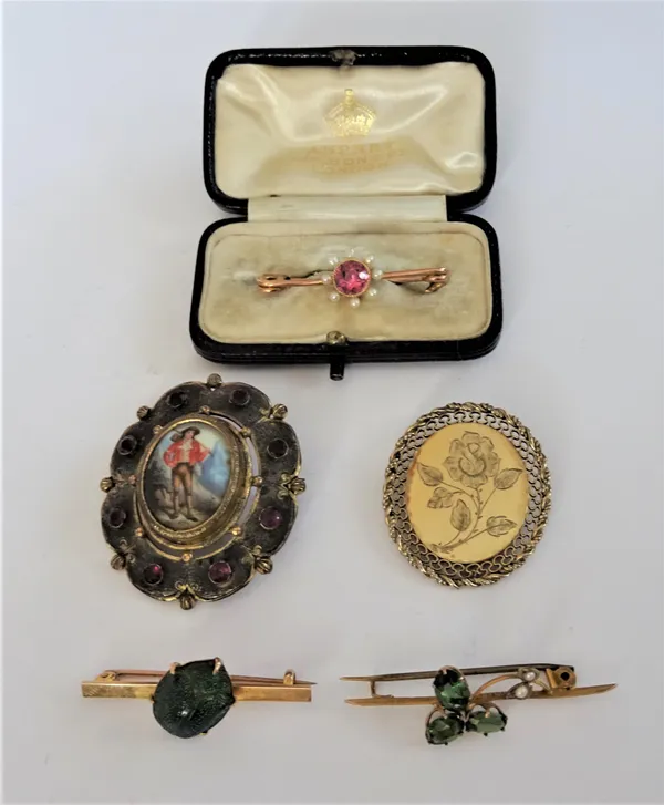 A gold, pink tourmaline and seed pearl bar brooch, with an Asprey London case, a bar brooch mounted with a scarab beetle, a green tourmaline and seed