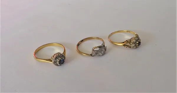 A gold, sapphire and diamond set cluster ring, detailed 18 CT, a gold, sapphire and diamond cluster ring, with split scrolled shoulders, detailed 18 C