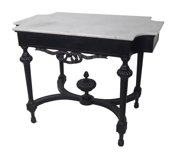 A 19th century centre table, the rectangular marble top with re-entrant corners, over an ebonised base, with ribbon tied frieze, on reeded tapering su