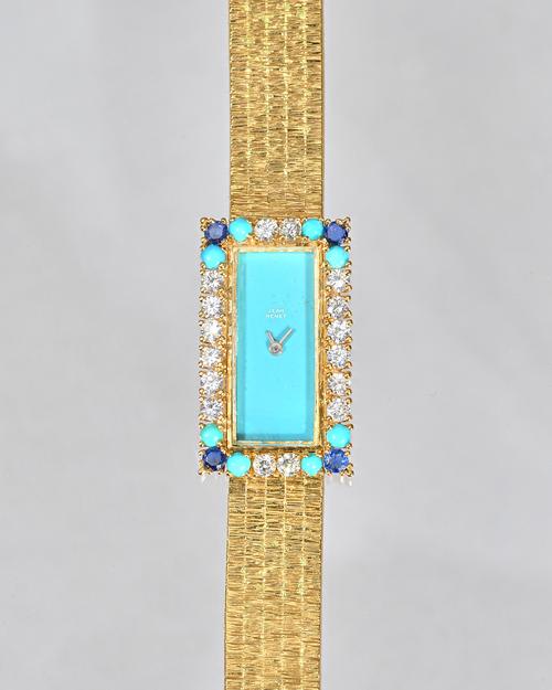 A Jean Renet gold, diamond, turquoise and sapphire set lady's bracelet wristwatch, the plain signed rectangular turquoise dial with silvered hands, th
