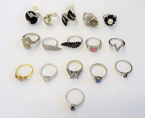 Sixteen silver and gem set rings, in a variety of designs, mostly detailed 925, (16).