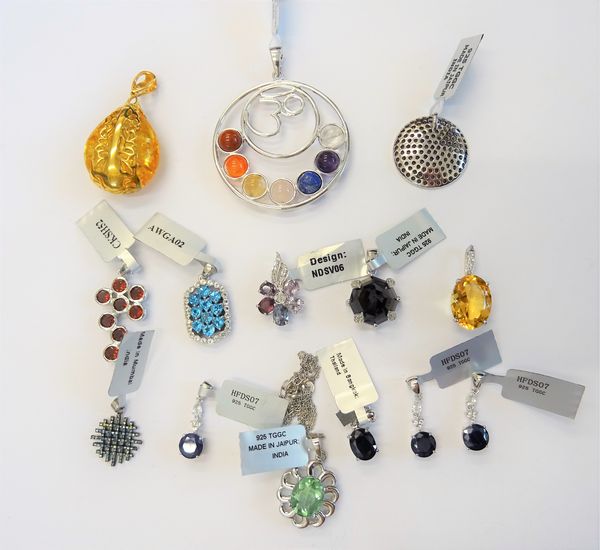 A group of mostly silver jewellery, comprising; fourteen pendants, in a variety of designs and a neckchain, (15).