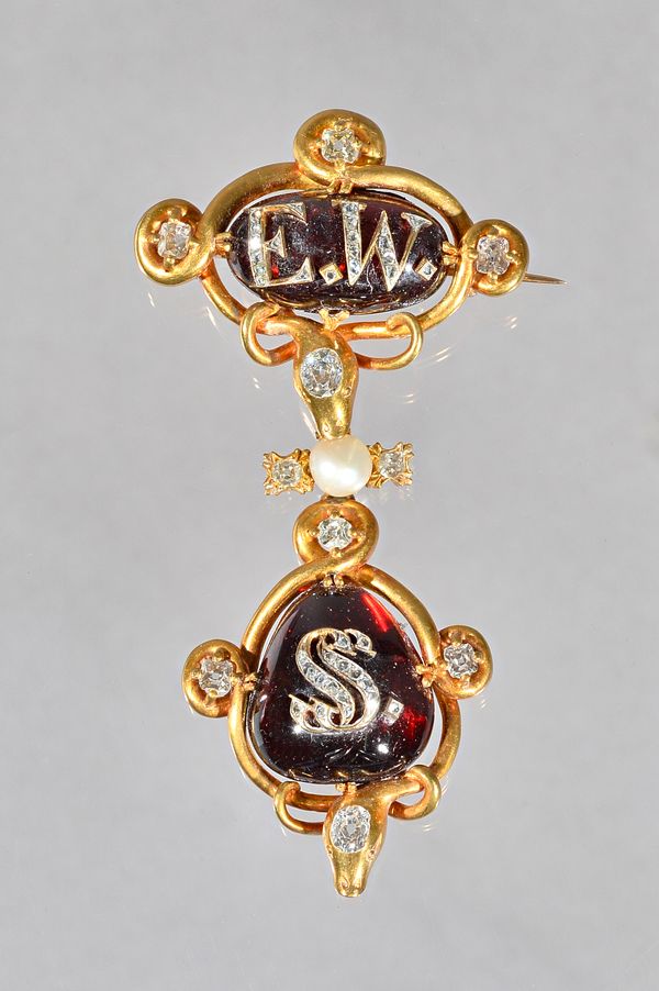 A Victorian gold, diamond, carbuncle garnet and pearl set brooch, the top mounted with a cushion shaped carbuncle garnet applied with the diamond set