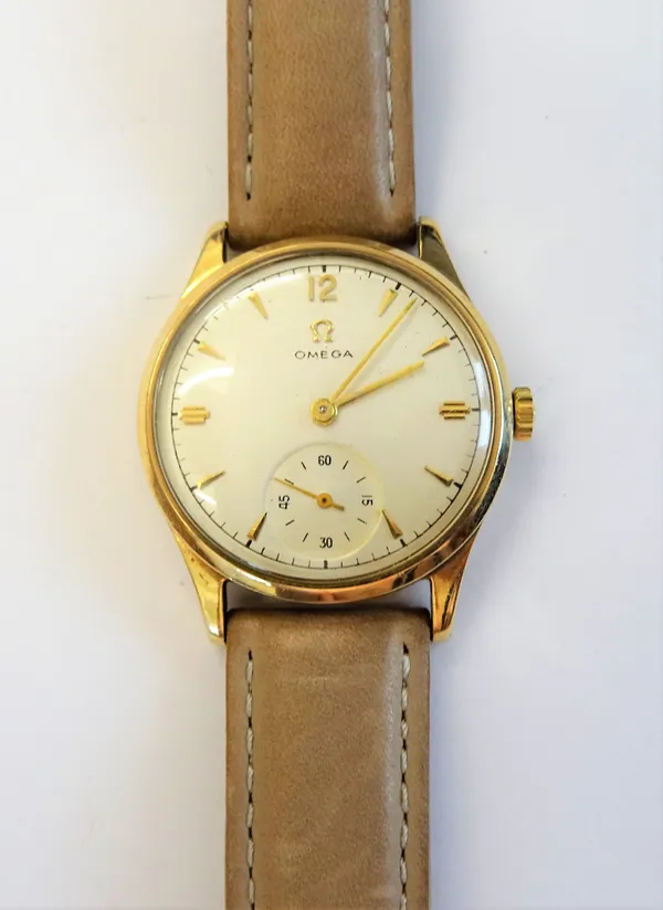 An Omega 9ct gold circular cased gentleman's wristwatch, with a signed jewelled movement detailed 12287021, the signed silvered dial with gilt numeral