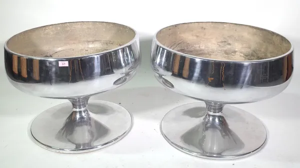 A pair of large silvered metal planters, each of circular waisted form, 64cm diameter. (2) Provenance; property from the late Sir David Tang This lot