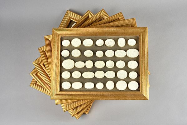 A quantity of plaster intaglios- probably 18th century, remounted in six modern giltwood frames, approx 210.  Frames 46cm x 34cm. (6)  Provenance; pro