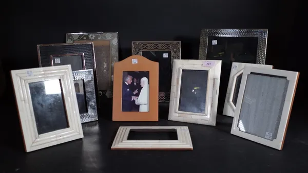 A quantity of modern strut back photographic frames, including a Linley leather bound frame, (23.5cm high). (11) Provenance; property from the late Si