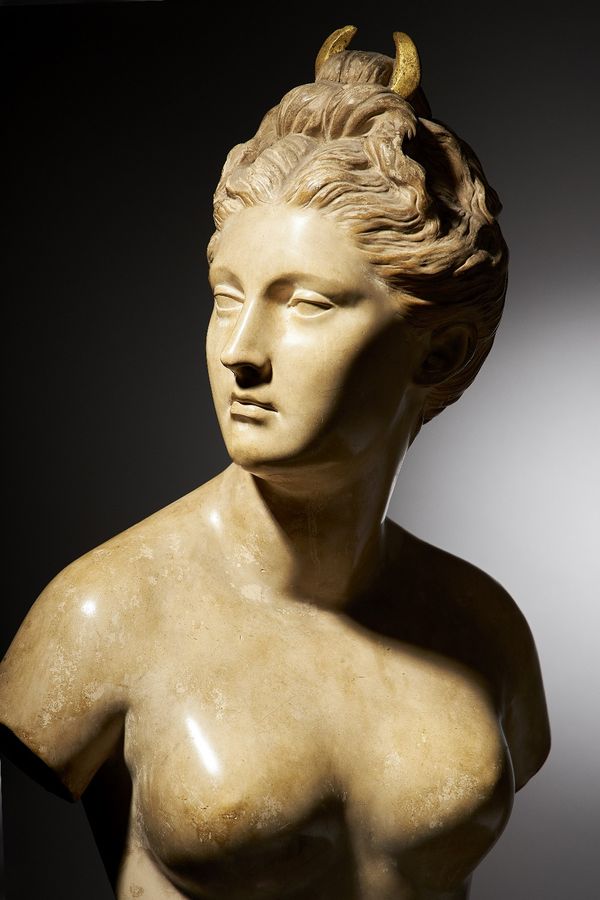 Friedrich Goldscheider; an early 20th century pottery bust of a goddess emblematic of night (Luna), circa 1900, with gilt crescent moon to her hair, w