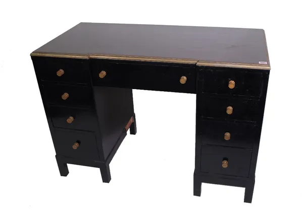 Morris & Co, Glasgow; an early 20th century ebonised and brass mounted breakfront kneehole desk, top with simulated porphyry inset, brass maker's plaq