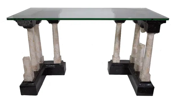 A 20th century glass top console table on two marble column pedestals. Provenance; property from the late Sir David Tang This lot has been imported fr