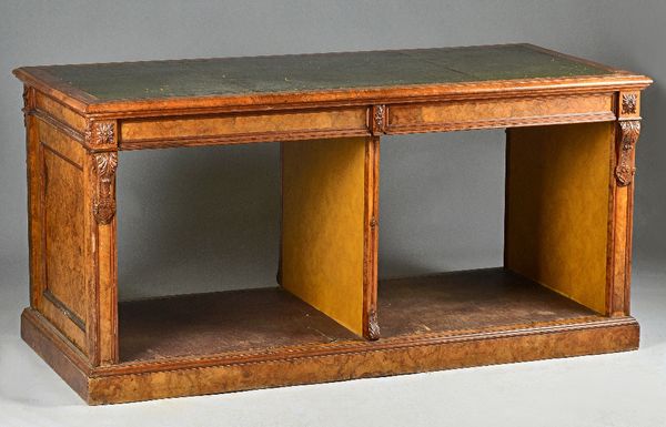 A William IV burr walnut folio cabinet in the manner of Gillows, leather inset rectangular top above four drawers, panelled ends, plinth base, 189cm w