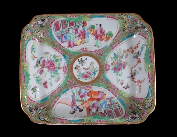 A Canton Famille-rose rectangular dish, 19th century, painted with panels of figures and birds in branches, 21.5cm wide. Provenance; property from the