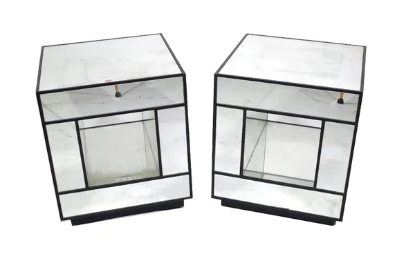 A pair of 20th century mirrored and ebonised cube side tables on plinth base, 46cm wide x 56cm high. (2) Provenance; property from the late Sir David