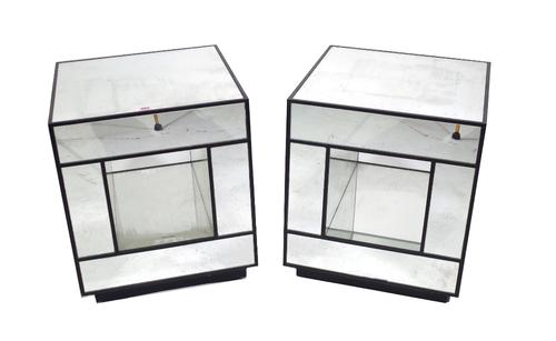 A pair of 20th century mirrored and ebonised cube side tables on plinth base, 46cm wide x 56cm high. (2) Provenance; property from the late Sir David