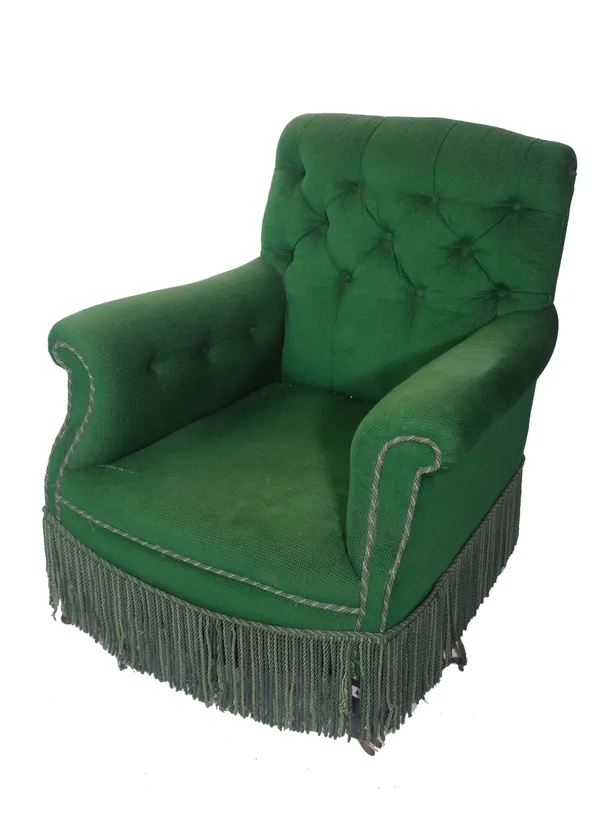 An early 20th century mahogany framed Heals style low armchair on tapering supports with green button back upholstery, 84cm wide x 87cm high. Provenan