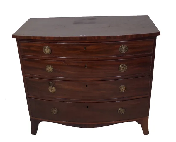 A George III mahogany bowfront chest, of four long graduated drawers on splayed bracket feet, 46cm wide x 53cm deep x 86cm high. Provenance; property