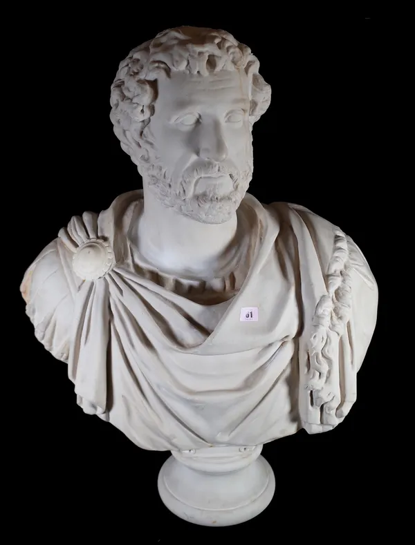 After the Antique; a modern resin bust depicting a man in Roman clothing, on turned socle, 86cm high.  Provenance; property from the late Sir David Ta