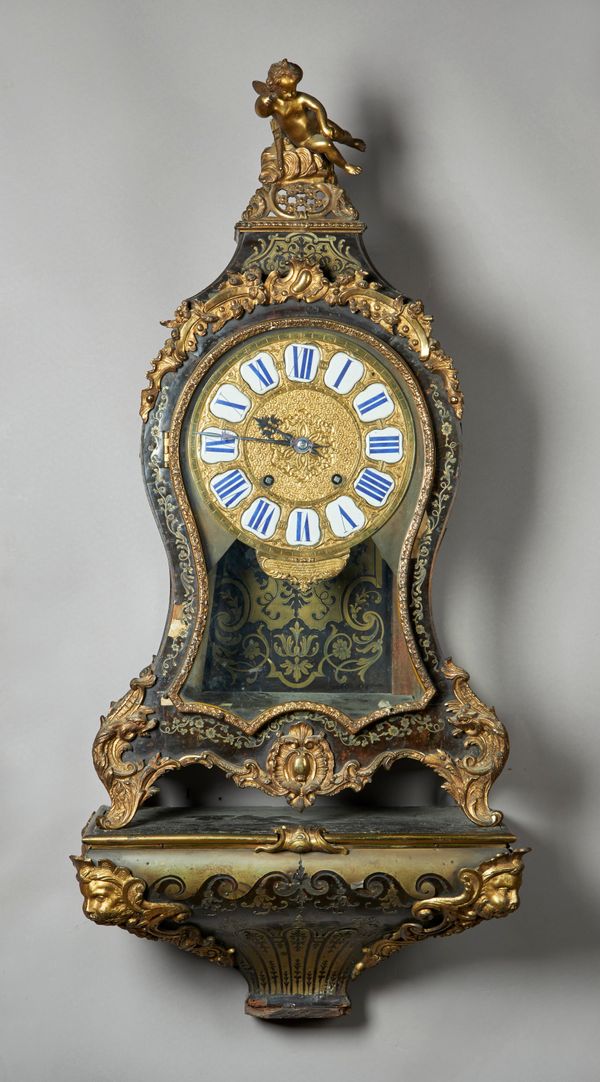 A FRENCH ORMOLU-MOUNTED TORTOISESHELL AND CUT BRASS INLAID 'BOULLE' BRACKET CLOCK AND BRACKETIn the Louis XV style,The pediment, case and plinth mount