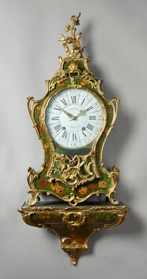 A LOUIS XV ORMOLU-MOUNTED GREEN AND FOLIATE LACQUERED BRACKET CLOCK AND BRACKETBy Bichon A MoulinThe shaped case with foliate mounts, surmounted by a