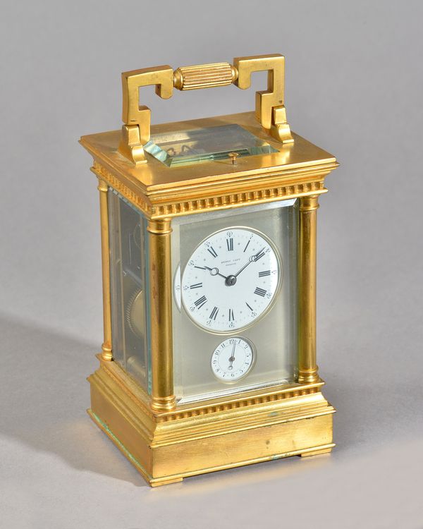 A FRENCH GILT-BRASS REPEATING CARRIAGE CLOCKFor Henry Capt, Geneva, by A. Margaine, circa 1890In an Anglaise Riche case, the silvered dial surround en