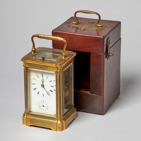 A FRENCH BRASS REPEATING CARRIAGE CLOCK WITH MAHOGANY CASENo. 6323, probably circa 1860The rectangular case with moulded uprights, the twin train move