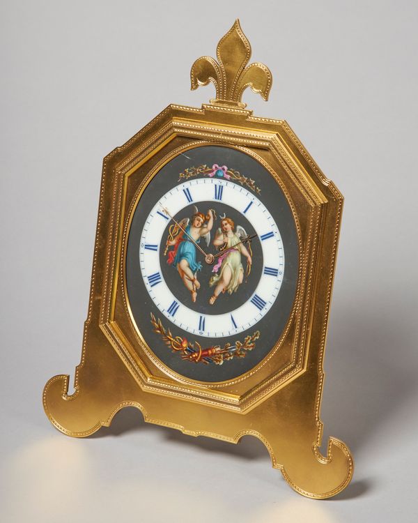 A RARE VICTORIAN LARGE ENGRAVED GILT-BRASS AND PORCELAIN STRUT TIMEPIECE By Thomas Cole, No. 1833,  London, circa 1863, retailed by C. F. Hancock, 39