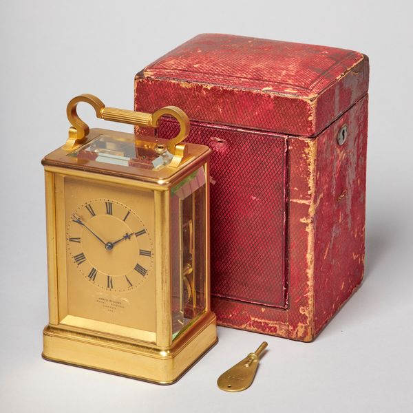 An English gilt-bronze carriage clock By James McCabe, London, No. 2946 Circa 1860The rectangular case with bevelled glass top and side panels, the en