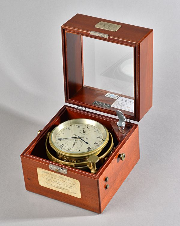 A MAHOGANY CASED TWO-DAY MARINE CHRONOMETERBy Thomas Mercer, London, No. 25236, 1964The plain two-piece case with glazed observation lid, the front wi