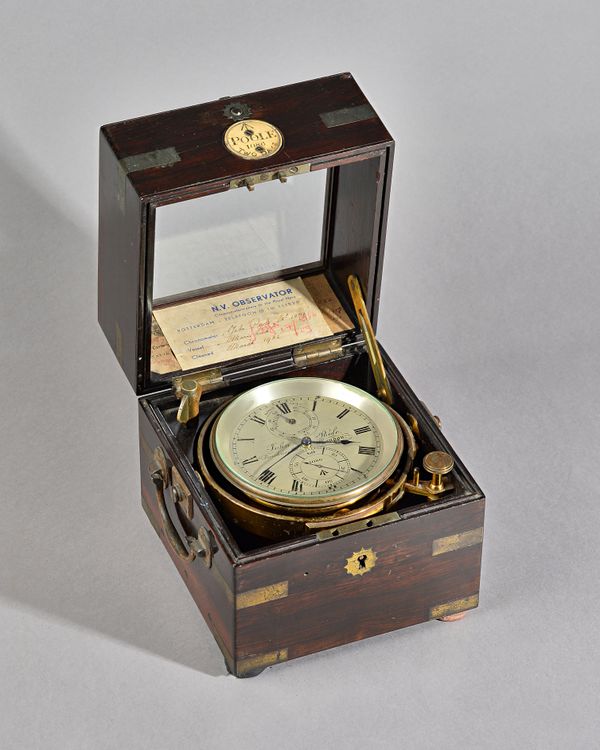 A HISTORICALLY INTERESTING BRASS-BOUND ROSEWOOD TWO-DAY MARINE CHRONOMETER WITH AUXILLARY COMPENSATIONBy John Poole, London, No. 1086, circa 1844, use