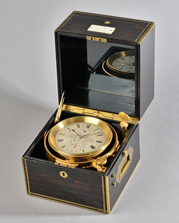 A Fine brass-mounted calamander eight-day marine chronometer with Poole's auxillary compensation  Probably by Victor Kullberg Retailed by Dobbie McInn