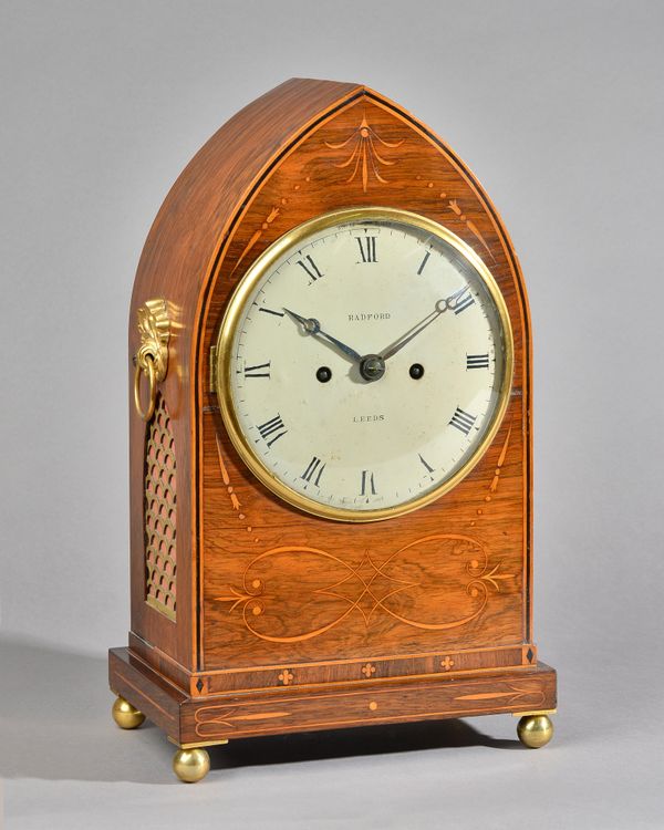 A REGENCY ROSEWOOD INLAID AND OUTLINED BRACKET CLOCKThe dial inscribed Radford, Leeds, circa 1810The lancet-shaped case with outlined edge, and inlaid