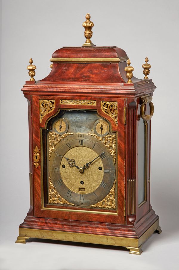 A GEORGE III GILT-BRASS-MOUNTED MAHOGANY QUARTER-CHIMING MUSICAL TABLE CLOCK By Eardley Norton, London, No. 795, Circa 1770The bell-top case with five