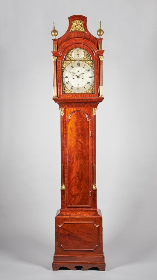 A FINE GEORGE III GILT-BRASS-MOUNTED MAHOGANY LONGCASE CLOCKBy George Jamison, London, circa 1790Surmounted by a pagoda pediment with foliate scroll-c