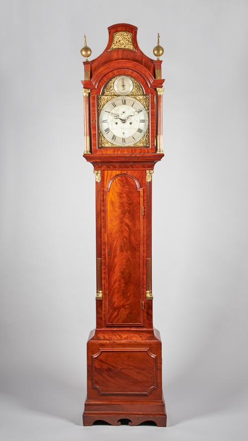 A FINE GEORGE III GILT-BRASS-MOUNTED MAHOGANY LONGCASE CLOCKBy George Jamison, London, circa 1790Surmounted by a pagoda pediment with foliate scroll-c