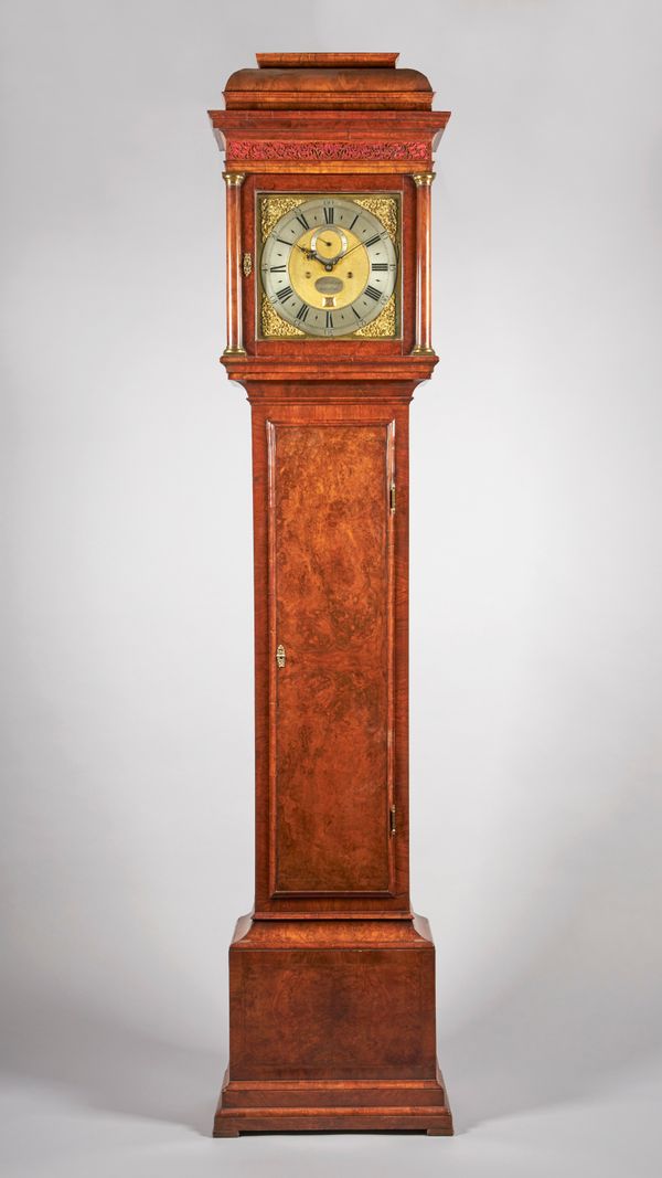 A GEORGE II WALNUT LONGCASE CLOCKThe movement by George Graham, No. 709, circa 1733, the case associated and of the periodThe cushion-moulded hood wit