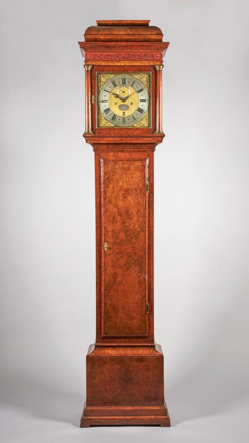A GEORGE II WALNUT LONGCASE CLOCKThe movement by George Graham, No. 709, circa 1733, the case associated and of the periodThe cushion-moulded hood wit