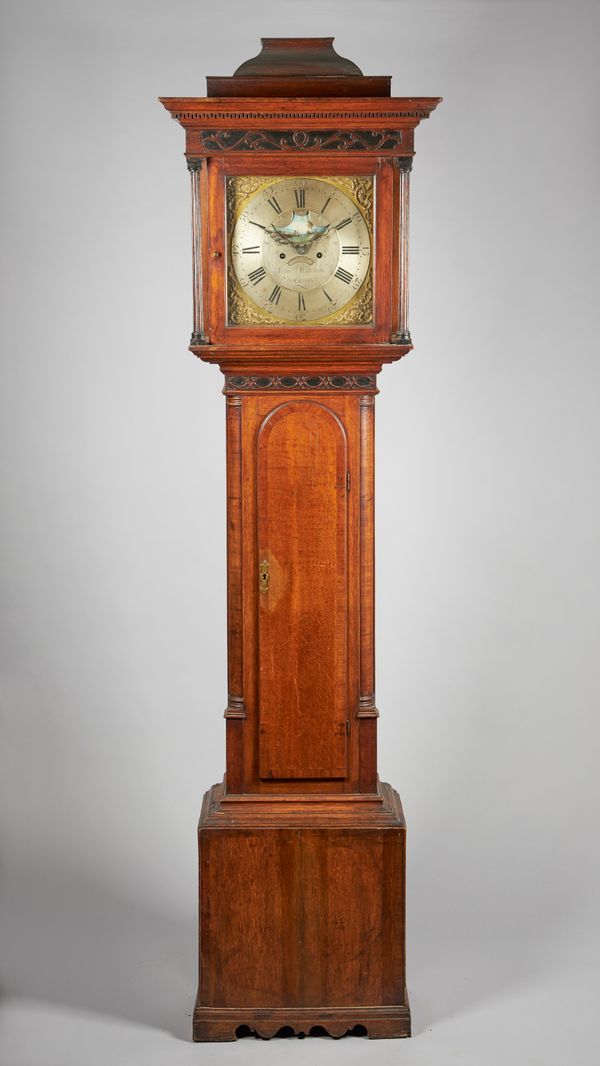 A GEORGE III OAK LONGCASE CLOCKBy Thomas Barrow, Stockport, circa 1785The case with a bell-top pediment above a moulded cornice with Greek key ornamen