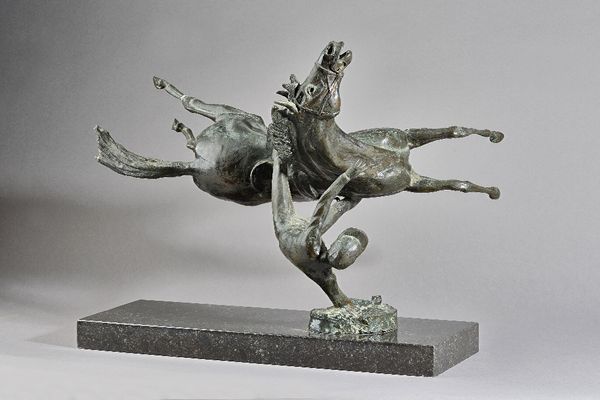 James Osbourne (191 -1992) a bronze depicting a falling horse and jockey, mounted on a black marble plinth, signed, numbered 4/10, dated 85, 55cm wide