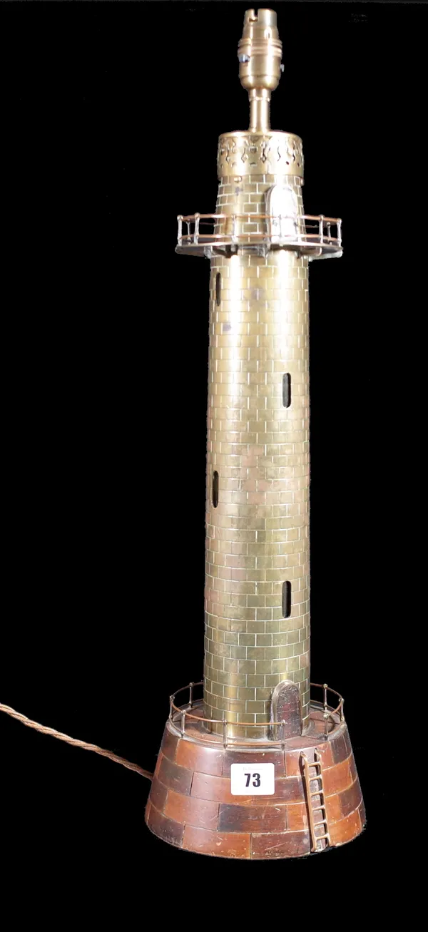 A 20th century brass table lamp formed as a lighthouse, on cased carved hardwood base, 62cm high. Provenance; property from the late Sir David TangThi