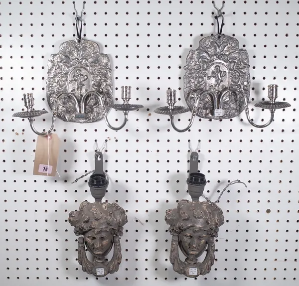 A pair of 18th century style white metal twin branch wall appliques, with relief cast figural/foliate back plates, 20.5cm high and a pair of grey pain