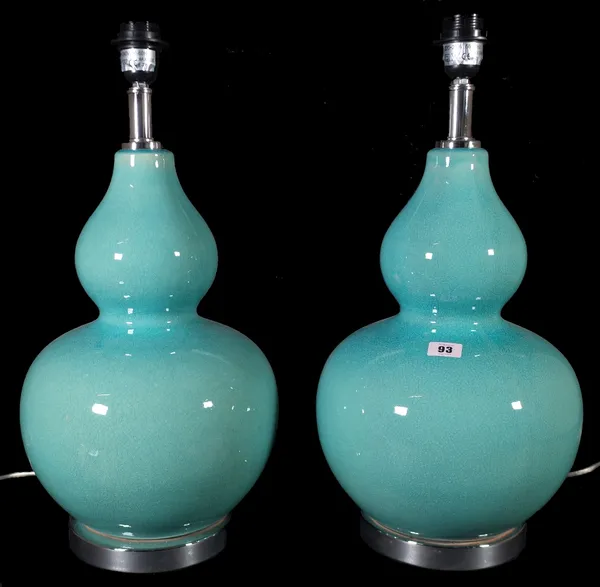 A pair of 20th century Chinese style blue ceramic double gourd shape table lamps, 57cm high. (2)  Provenance; property from the late Sir David TangThi