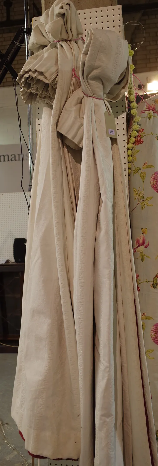 Two pairs of lined white cotton curtains with red lining, each 160cm wide x 220cm drop.