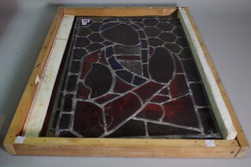 Two stained glass leaded windows depicting St Francis, detailed 'FRANCIS' down one side and one further stained glass panel, 55cm x 39cm, (3).