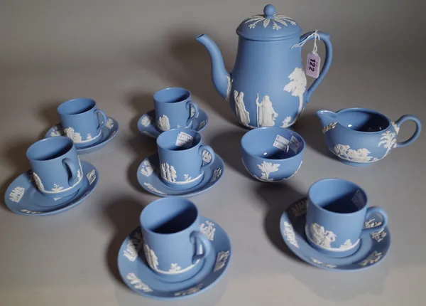 A Wedgwood blue jasper coffee set, 20th century, sprigged in white with classical figures, comprising; a coffee pot and cover, milk jug, sugar bowl, s