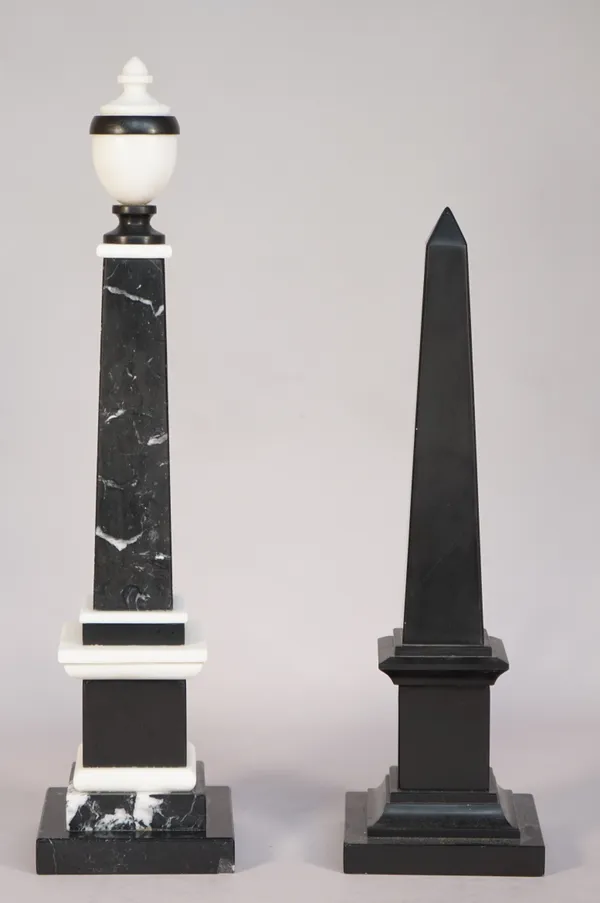 A 20th century black and white marble obelisk of sectional form, 45.5cm high and another smaller black marble obelisk, 37.5cm high, (2).