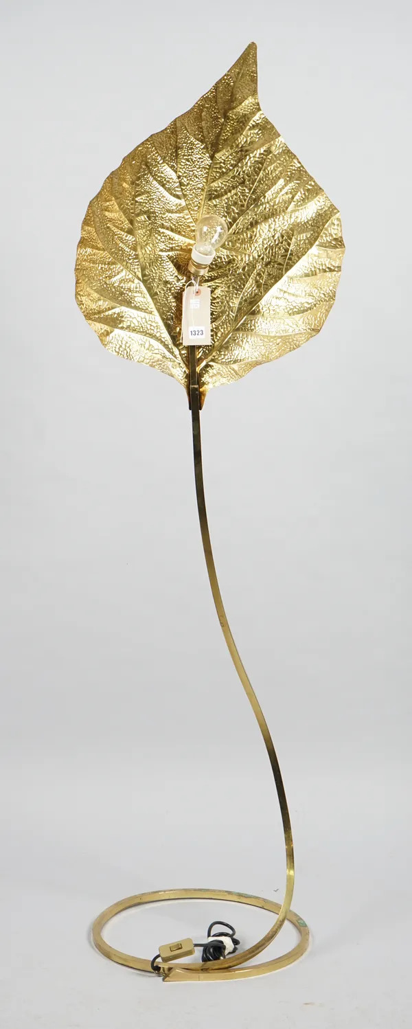 A Tomasso Barbi brass single leaf Italian floor lamp, circa 1970s, with embossed leaf shade on a coiled base, 175cm high.