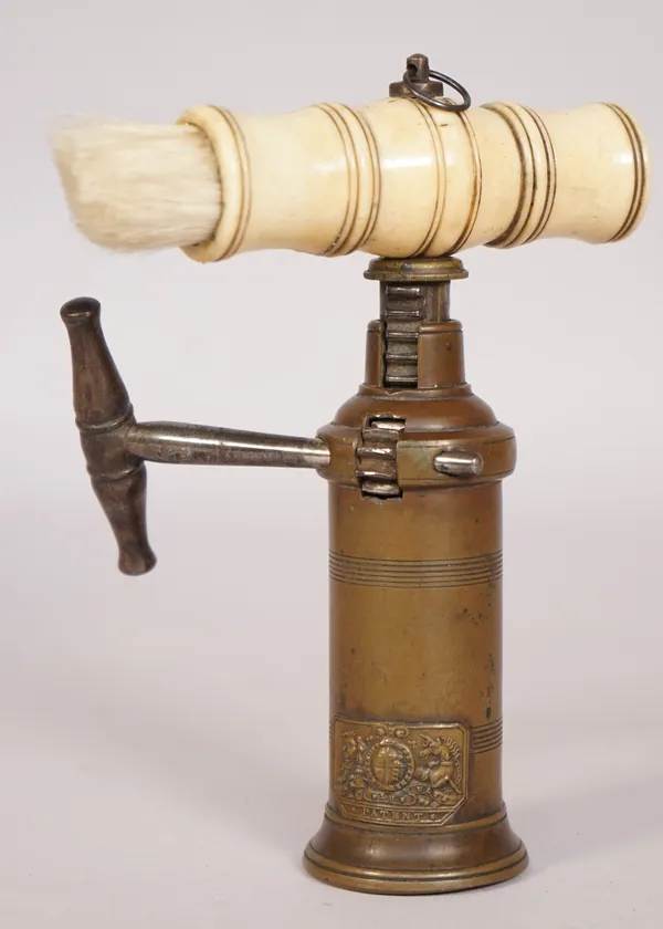 A mid-19th century Thomason type wide rack corkscrew, with turned bone handle and brush, steel side handle and badge marked 'Patent', below lion and u