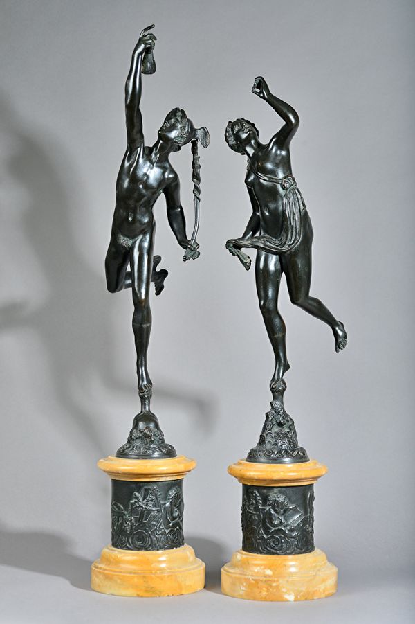 After Giambologna, a pair of late 19th century bronze figures, 'Mars' and 'Minerva', each raised on a marble circular base, clad with an embossed bron