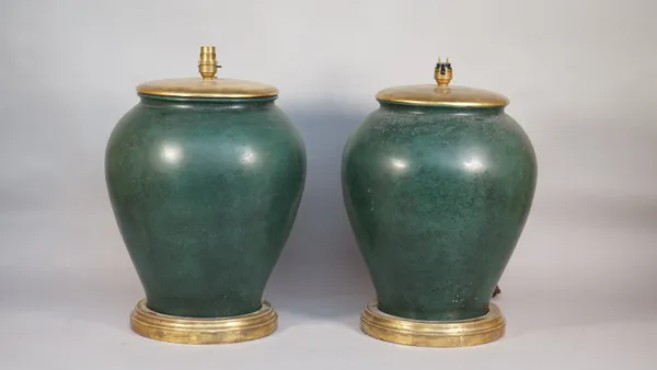 A pair of modern green pottery table lamps, each of bulbous tapering form with giltwood mounts and cream pleated shades, lamps 40cm high, (2).